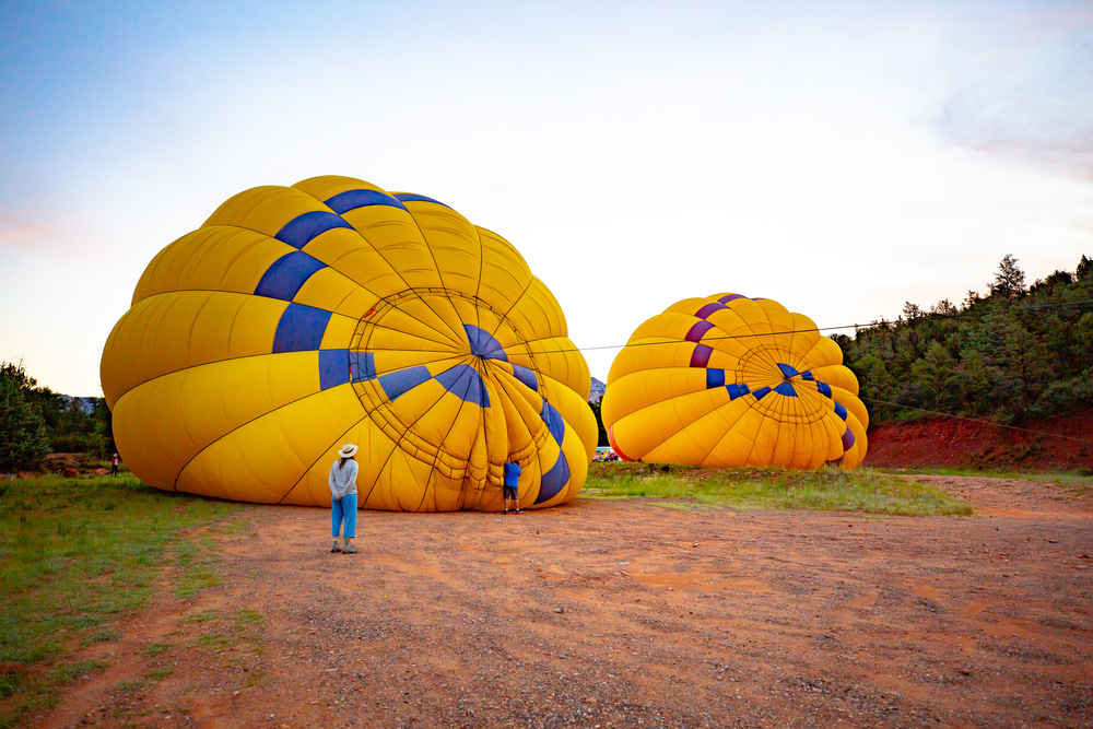 Hot,Air,Balloons,At,Sunrise,|,Inflating,Canyon,Sedona,Arizona