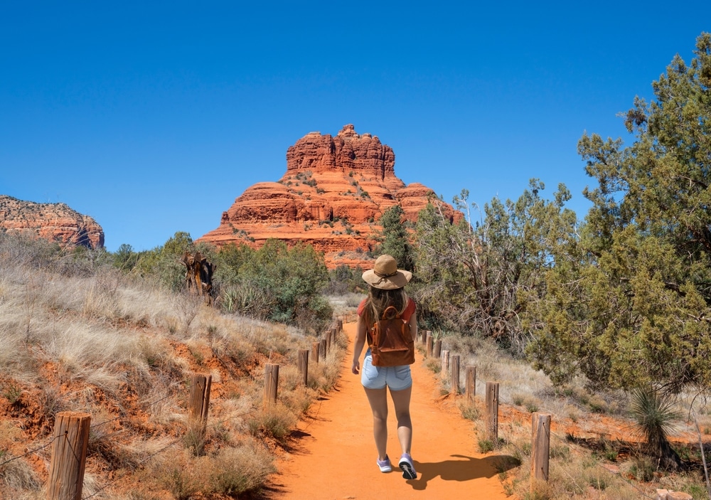 Girl,On,Spring,Hiking,Trip,In,Red,Mountains.,Woman,Walking