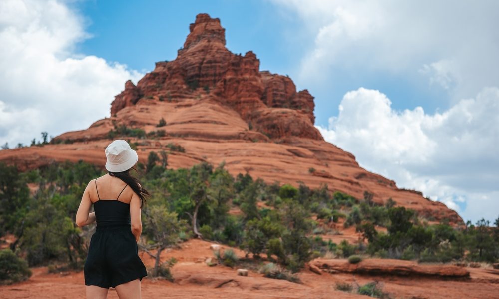 Young,Woman,Enjoys,The,View,Of,The,Sedona,Landscape,From